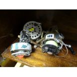 Four vintage fishing reels etc