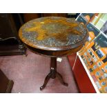 Eastern carved hardwood and brass inlaid circular top tripod table