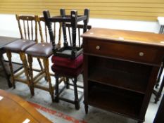 A reproduction mahogany effect open bookcase with top drawer, a pair of bar stools with cushioned