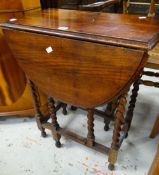 A small drop leaf barley-twist gateleg table Condition reports provided on request by email for this