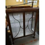 A vintage two-door china cabinet Condition reports provided on request by email for this auction