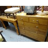 A pine chest of drawers together with a pine kitchen table Condition reports provided on request