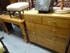 A pine chest of drawers together with a pine kitchen table Condition reports provided on request