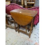 A small barley-twist drop leaf table Condition reports provided on request by email for this auction