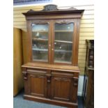 Victorian mahogany two-stage bookcase cupboard having glazed top above two blind panel cupboards, on