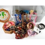 A quantity of costume jewellery and beads ETC Condition reports provided on request by email for