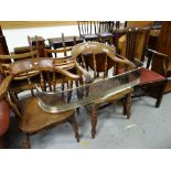 Two smokers-bow elbow chairs, a Chippendale-style elbow chair and a brass fender Condition reports