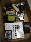 Box of approx. ten cameras, lenses and binoculars including a Photoshop software camera, Canon and