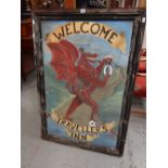 A two-sided painted pub sign 'Welcome Traveller's Inn' Condition reports provided on request by