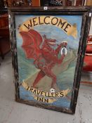A two-sided painted pub sign 'Welcome Traveller's Inn' Condition reports provided on request by