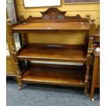 Late nineteenth / early twentieth century mahogany three-tier dumbwaiter raised on ceramic castors