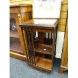 Inlaid mahogany square section revolving bookcase Condition reports provided on request by email for