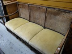 A rush backed three-seater sofa Condition reports provided on request by email for this auction