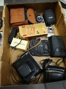 Box of approx. ten cameras including cameras, lenses, binoculars including an Olympus trip 35,