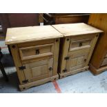 Pair of modern pine bedside cupboards with single drawer above blind panel cupboard (2) Condition