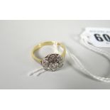 An 18ct yellow gold & platinum diamond ring, 4.5grams Condition reports provided on request by email