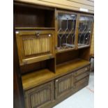 Mid-twentieth century oak linen-fold design wall unit display cabinet Condition reports provided