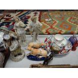 A parcel of mixed china including continental figurine, Royal Doulton figurine 'Marie', Imari plate,
