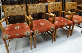 A set of four mid-century cane back chairs with tapestry cushion seats Condition reports provided on