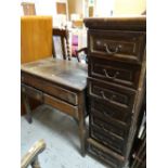 A tall seven drawer chest and a table with one long drawer above two short drawers Condition reports