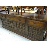 A reproduction Jacobean-style long darkwood sideboard, 206cms wide Condition reports provided on