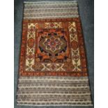 An Old Baluchi rug, 151 x 93cms Condition reports provided on request by email for this auction