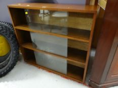 A vintage three-tier sliding door bookcase Condition reports provided on request by email for this