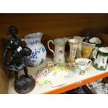 A parcel of pottery jugs, a spelter figurine and a Beswick pottery wall mounted flower basket