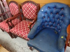 An antique button back blue upholstered armchair and a pair of carved armchairs with padded seats