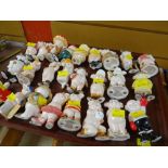 Collection of novelty ceramic 'Piggies' together with display stand Condition reports provided on