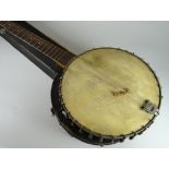 A vintage five-string cased banjo and a cased Boosey & Hawkes clarinet Condition reports provided on