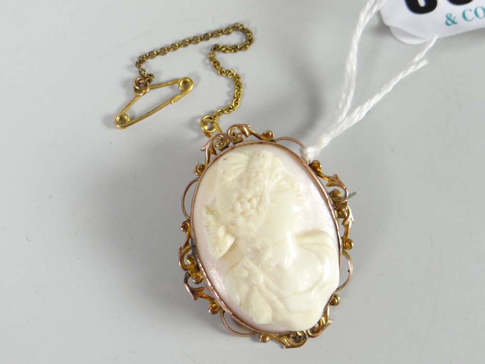 A 9ct gold framed cameo brooch Condition reports provided on request by email for this auction