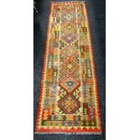 A vegetable dye wool Kelim runner, 78 x 257cms Condition reports provided on request by email for
