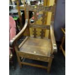 An 1897/1898 oak Eisteddfod chair, carved with both dates & inscribed 'Bont ar dan' Condition