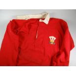 A 1953-1957 WALES RUGBY UNION MATCH WORN JERSEY NUMBER 4, ISSUED TO GARETH GRIFFITHS with white