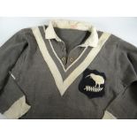 A 1950s NEW ZEALAND KIWIS RUGBY LEAGUE JERSEY with embroidered crest to stitched felt panel,