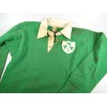 A 1950s IRISH RFU JERSEY NUMBER 14 MATCH-WORN with embroidered crest to a stitched shield panel,