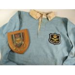 A 1950s RAF XV RUGBY UNION JERSEY NUMBER 5 ISSUED TO GARETH GRIFFITHS aquamarine with white collar
