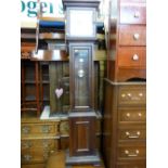 Modern grandmother clock with brass and silvered dial