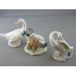 Lladro goose and two Nao figurines - goose and dog with cat (chip to ear of cat)