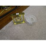 Decorative pedestal glass bowl and an ornamental brass effect mantel clock