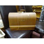 Wooden cased Singer sewing machine