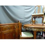 Reproduction Oriental hardwood dining suite of sideboard with carved front, 180 cms long together