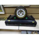 Good size slate mantel clock with scroll detail to the base