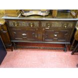 Polished wood railback sideboard with twin carved front drawers over 'X' fronted drawers with