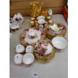 Parcel of Royal Albert pink and red rose decorated teaware, gold coloured lustre teaware etc