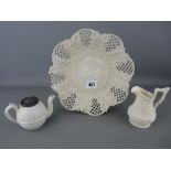 Cream ware reticulated plate (damage), a small Victorian relief patterned teapot and a similarly
