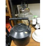 Glass lidded butter churn and an iron kettle