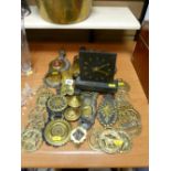 Quantity of horse brasses, slate mantel clock and Swarovski type ornaments