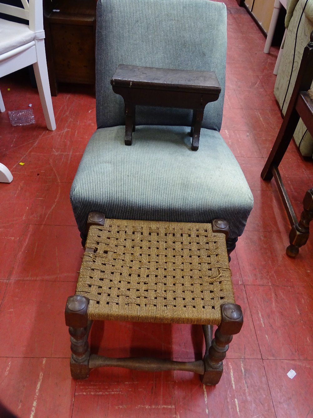 Small green textured nursing chair, string topped stool and a small wooden footstool